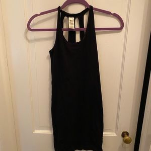 Tight black dress w cut out detail and back